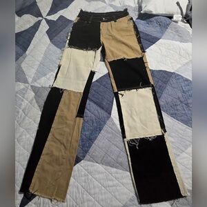Patchwork Black and Tan Jeans